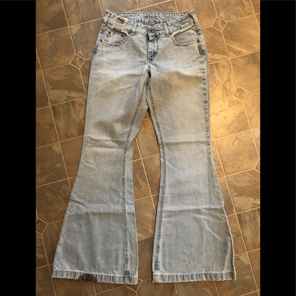 Brand new Silver Pica bell bottom jeans